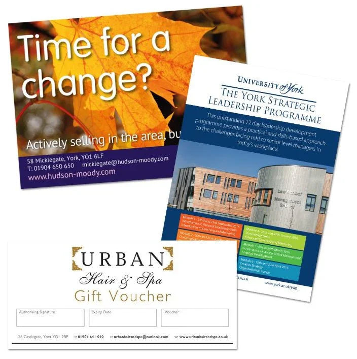 Sample A5 flyers and gift voucher designs for local businesses and events displayed together.