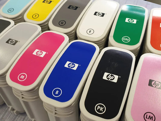 Close-up of assorted HP ink cartridges in various colors for printers