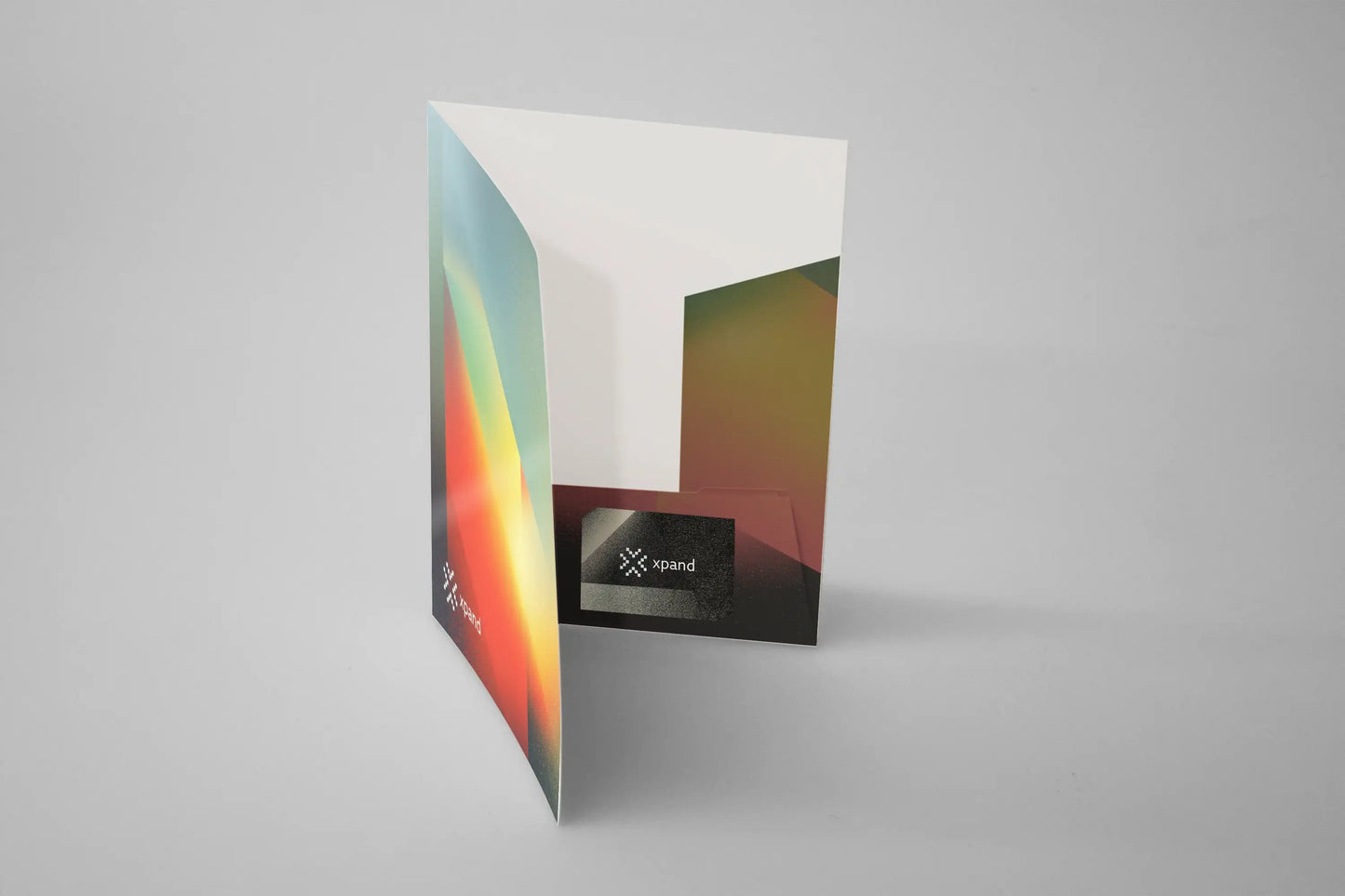 Colorful interlocking presentation folder with pocket and abstract gradient design